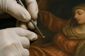 Art Restoration in Progress: Skilled hands, meticulously adorned with sterile gloves, delicately restore a classic masterpiece using specialized tools.