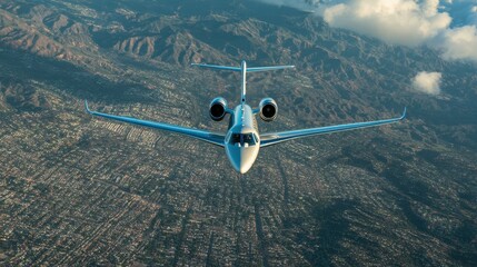 Front view of a Citation X jet above Southern California