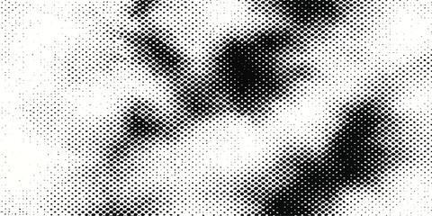 Black and white geometric pattern with circular and square elements in a seamless design