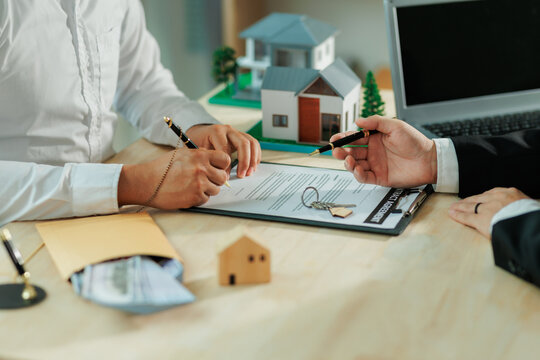 The real estate agent explains how to apply for a home warranty.