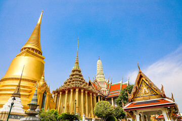 Fototapeta premium Wat Phra Kaew or Wat Phra Sri Rattana Satsadaram is temple used for various royal ceremonies during reign of King Rama I. It is temple within the Grand Palace. Inside temple is the Emerald Buddha.