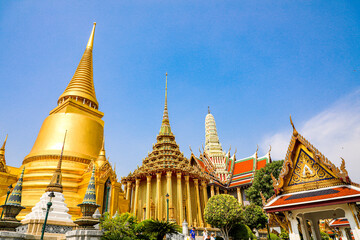 Fototapeta premium Wat Phra Kaew or Wat Phra Sri Rattana Satsadaram is temple used for various royal ceremonies during reign of King Rama I. It is temple within the Grand Palace. Inside temple is the Emerald Buddha.