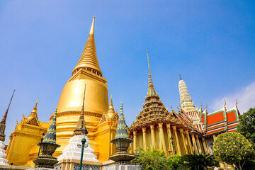 Fototapeta premium Wat Phra Kaew or Wat Phra Sri Rattana Satsadaram is temple used for various royal ceremonies during reign of King Rama I. It is temple within the Grand Palace. Inside temple is the Emerald Buddha.