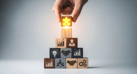 Hand Placing Glowing Puzzle Piece Atop Business Strategy Cubes