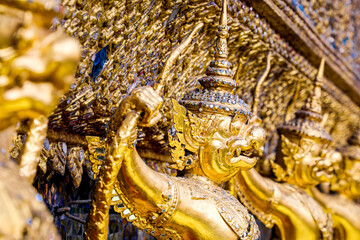 Fototapeta premium Wat Phra Kaew or Wat Phra Sri Rattana Satsadaram is temple used for various royal ceremonies during reign of King Rama I. It is temple within the Grand Palace. Inside temple is the Emerald Buddha.