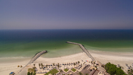 Beautiful area of beach in Ajman timelapse near the turquoise waters of Arabian Gulf.