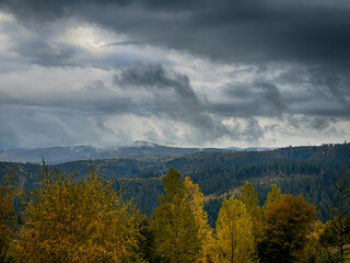 Misty Autumn Rain Clouds over Ukrainian Carpathian Mountains.