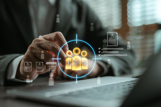 Businessman using digital HR interface to select target candidates, illustrating modern recruitment, talent acquisition strategy, and efficient employee selection process.