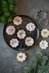 Christmas homemade gingerbread cookies on wooden table