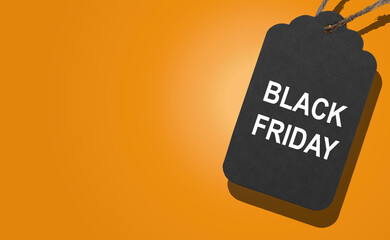 Black Friday tag banner. cardboard label with orange accents and hanging loop, symbol of sale, price