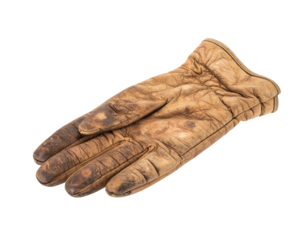 Aged weathered brown leather work glove lying flat with cracked surface, deep wrinkles and dirty patina, protective handwear studio close-up on isolated background