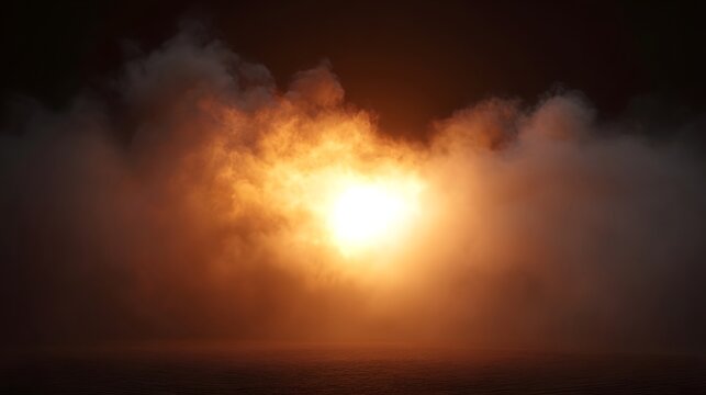 A brilliant fiery explosion bursts through dense swirling smoke and fog creating an intense glow against a dark atmospheric background