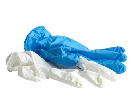 Crumpled disposable nitrile and latex gloves in blue and white, protective medical handwear for healthcare and cleaning, studio close-up on isolated background