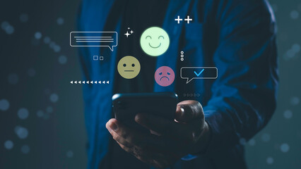 Sentiment analysis and opinion mining concept with user holding smartphone and emoji icons. Represents emotional data evaluation, customer feedback, and AI-powered response classification.