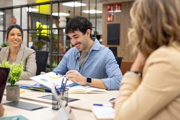 Diverse startup team collaborating during a business meeting