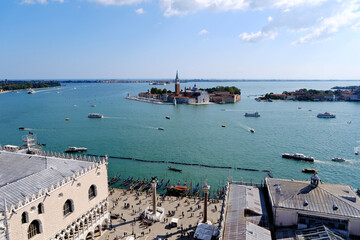 aerial high angle view of Venice, San Giorgio Maggiore Island in lagoon, with Doge's Palace rooftop