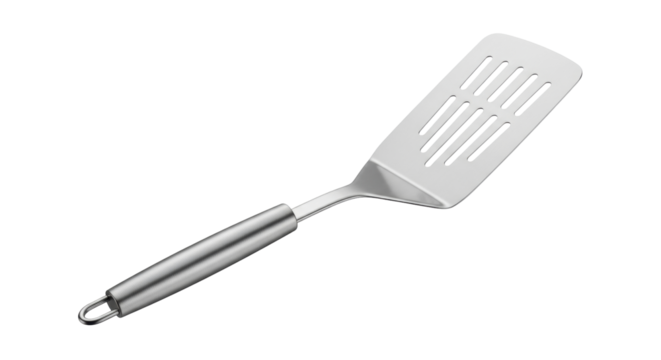 Isolated slotted turner rests at an angle, a cooking utensil with a silver handle & spatula head