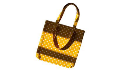 A shimmering golden tote bag with a woven texture and dark brown handles against a black background