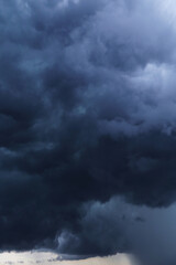 Fototapeta premium Epic Dramatic Storm sky with dark blue cumulus rainy cloud abstract background texture, thunderstorm