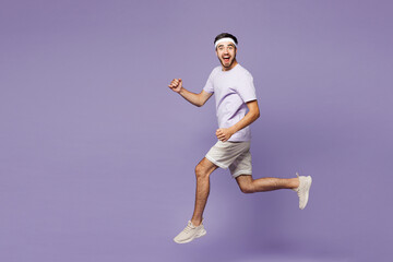 Full body side view young strong fitness trainer instructor sporty man sportsman wear sportswear...