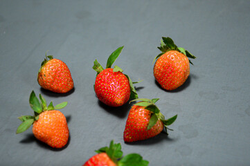 Fresh strawberry isolated on gray background 