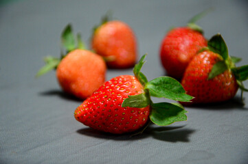 Fresh strawberry isolated on gray background 