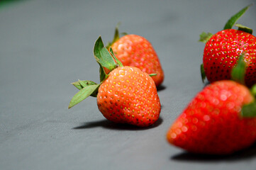 Fresh strawberry isolated on gray background 