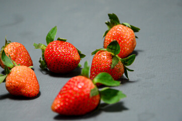 Fresh strawberry isolated on gray background 