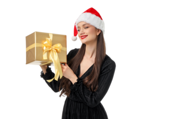 Woman in a Santa hat smiles with a gift