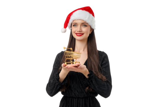 Woman in black dress holds gold shopping cart, isolated, PNG