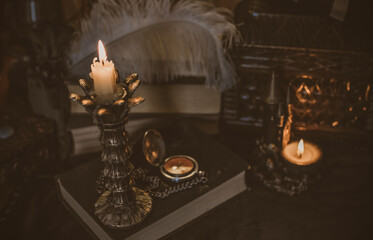 Mystical altar with candles, books, and divination stuff