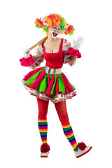 Funny female clown club-swinging. Entertainer woman Joker in colorful suit and wig. Buffoon with clown whiteface makeup. Trickster, jester, pantomime, mime. Professional actor