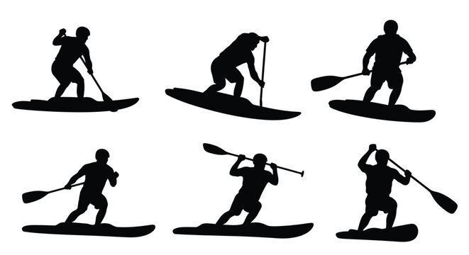 Silhouettes of people paddleboarding enjoying a watersport activity in dark shades