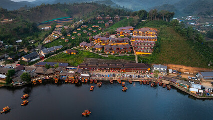 Traditional Chinese-style, tourist boats in dam or lake at Baan, Rak, Thai, Village Mae Hong Son, Thailand.