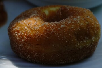 Sugar Coated Donut in Warm Light Macro Shot