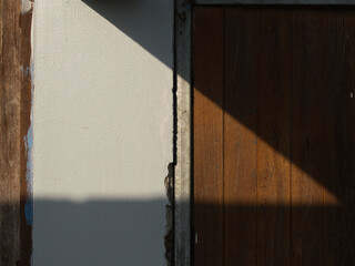 Concrete building with old wooden door