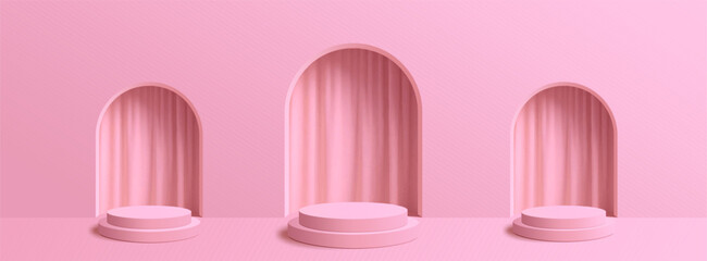 A soft pink backdrop showcases three pedestals with draped curtains in arched niches creating an elegant display.