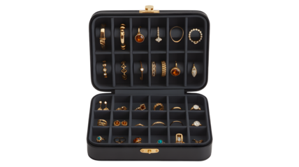A black jewelry box holding gold rings and earrings, transparent png, isolated.