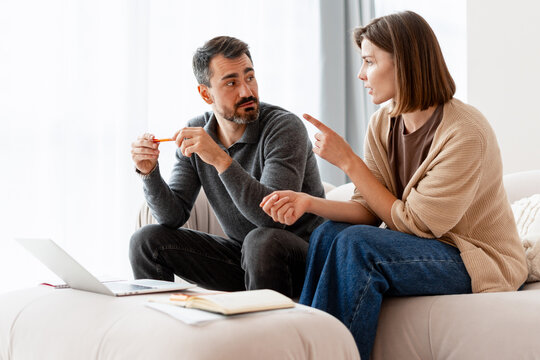 Couple arguing about serious relationship problems at home