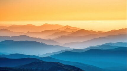 Obraz premium Serene Mountains Under Orange and Blue Sky at Sunrise, Capturing Layers of Hills and Tranquil Atmosphere in Natural Landscape