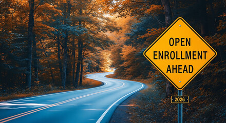 Naklejka premium A winding road through a forest with autumn foliage, leading towards a yellow diamondshaped sign that reads open enrollment ahead