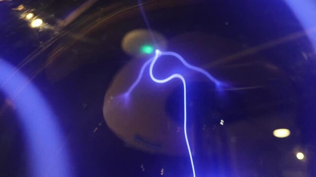 The plasma discharges in a glass sphere