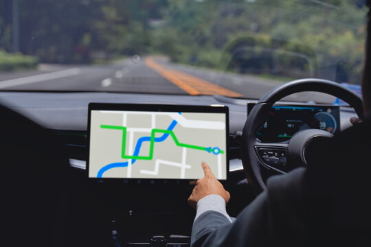 Car dashboard showing GPS map and route guidance system