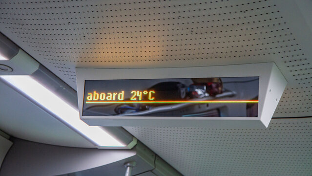 Digital temperature display in modern public transport - Powered by Adobe