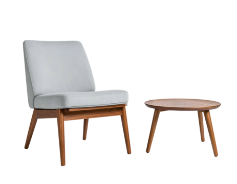 Cozy interior scene featuring a light gray upholstered chair and a round wooden side table