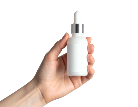Hand holding a white serum bottle with silver cap against a black background