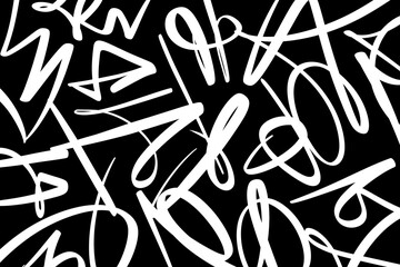 Abstract background with white brush strokes and lines on black surface. Modern graphic composition with dynamic shapes resembling calligraphy or graffiti marks. 
