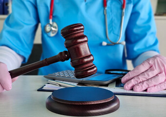 Judge gavel, forensic doctor, medical diagnosis