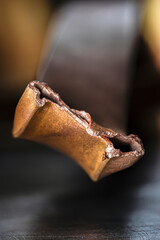 Oxidized broken copper profile, non-ferrous metal scrap, close-up of copper structure with industrial soft background