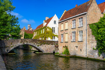 Fototapeta premium View of the historic city center of Bruges (Brugge), West Flanders province, Belgium. Cityscape of Bruges with canal.